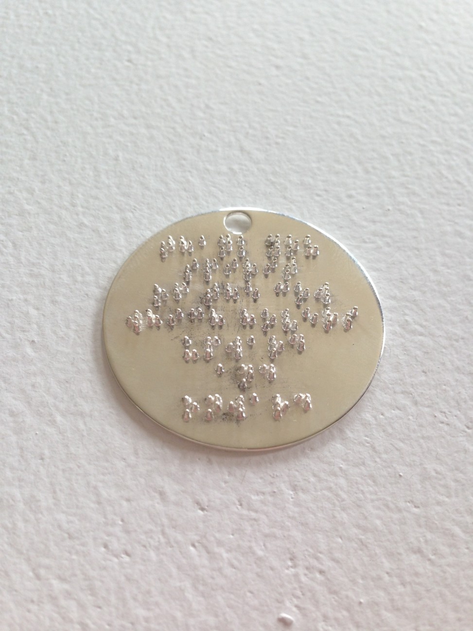 "Braille Coin" by Andrew Rosinski